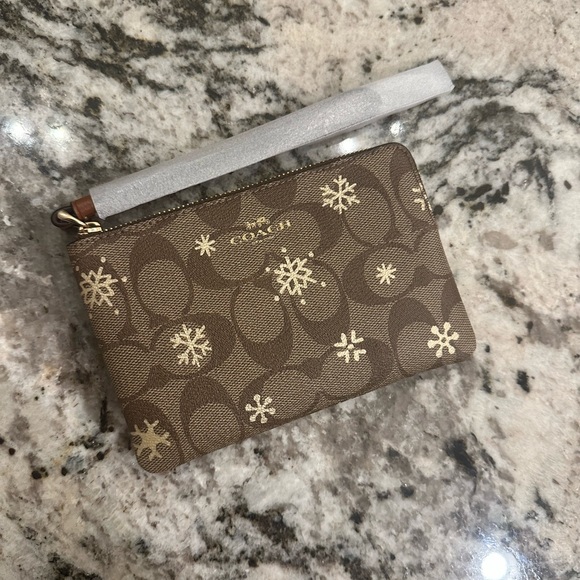Coach Handbags - NWT Coach snowflake wristlet